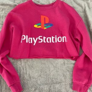 Pink “PlayStation” cropped sweater